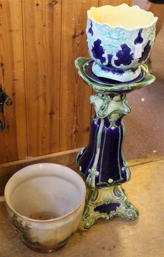 Majolica jardiniere decorated pond life, a dark blue/green glazed jardiniere stand & slightly similar jardiniere(-)